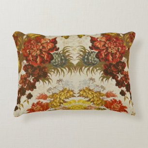 Textile with a repeating floral pattern accent pillow