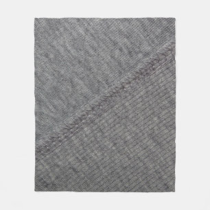 texture of gray fabric with abstract drawings and  fleece blanket