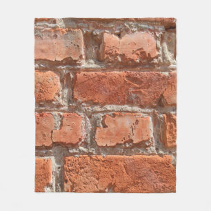 Texture of old weathered brick. Background of old Fleece Blanket
