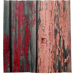 Texture of old wooden fence painted in red and ora