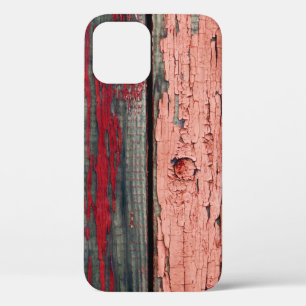 Texture of old wooden fence painted in red and ora iPhone 12 case