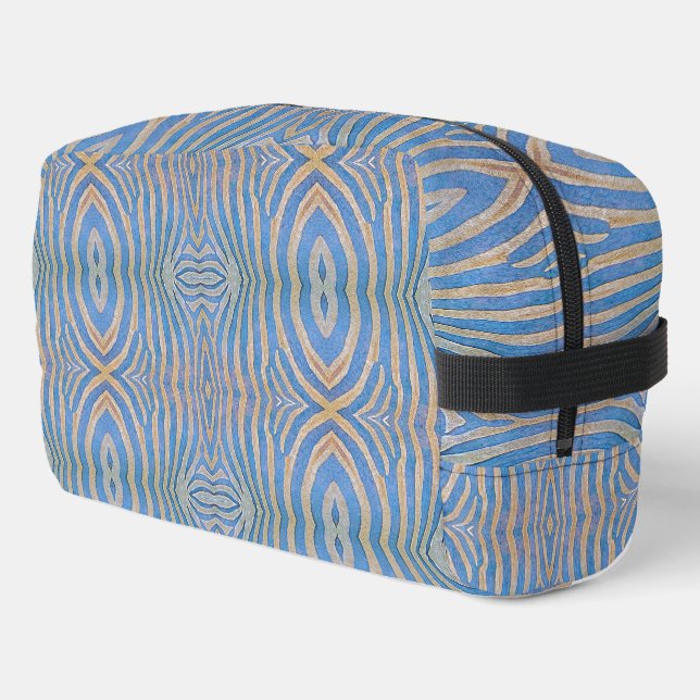 Textured, symmetrical blue and gold zebra pattern dopp kit (Left Corner)