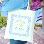 That's Amore Personalized Amalfi Coast Wedding Tote Bag<br><div class="desc">Welcome your guests in style with our customizable "That's Amore" wedding tote bags. Featuring a playful lemon design with soft blue accents, these elegant totes are perfect for holding wedding favours, programs, or gifts for your guests. Personalized with your names and wedding date, they bring a charming Mediterranean touch to...</div>