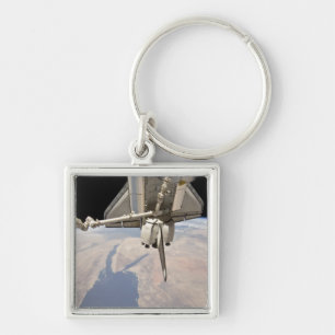 The aft section of the docked space shuttle keychain
