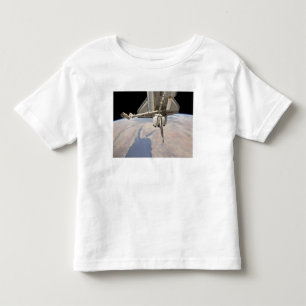 The aft section of the docked space shuttle toddler t-shirt