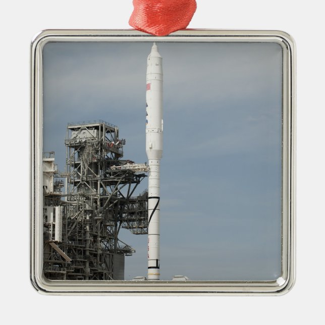 The Ares I-X rocket is seen on the launch pad Metal Ornament (Front)