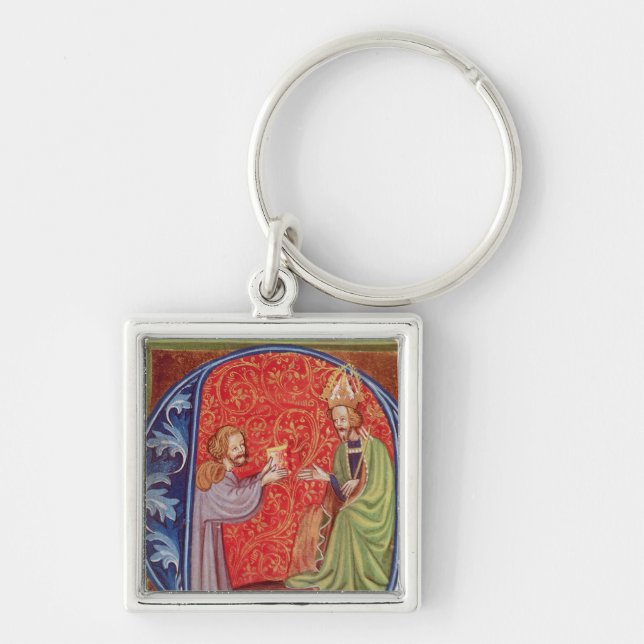 The Author Offering his Book Keychain (Front)