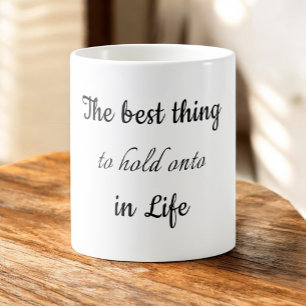 The Best Thing to Hold Onto in Life is Each Other Coffee Mug