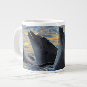 The bottle-nosed dolphins in sunset light large coffee mug