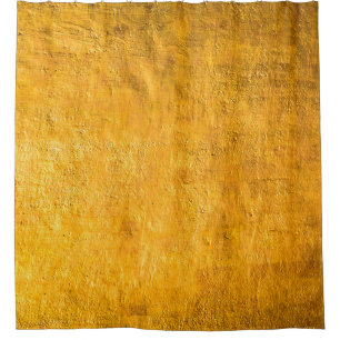 The brass concrete surface glows from the walls of