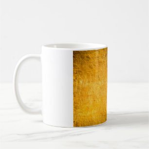 The brass concrete surface glows from the walls of coffee mug