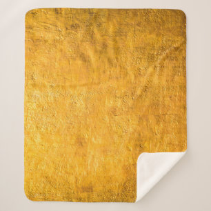 The brass concrete surface glows from the walls of sherpa blanket