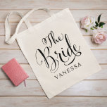 The Bride Personalized Black Script Wedding Tote Bag<br><div class="desc">Wedding The Bride tote bag features chic black script with custom name text - for the fabulous bride-to-be!</div>