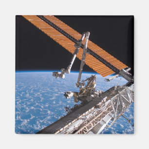 The Canadarm2 and solar array panel wings Magnet