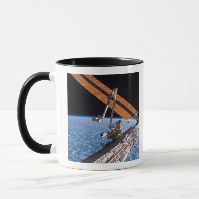 The Canadarm2 and solar array panel wings Mug (Left)
