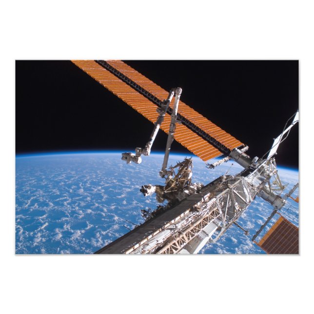 The Canadarm2 and solar array panel wings Photo Print (Front)