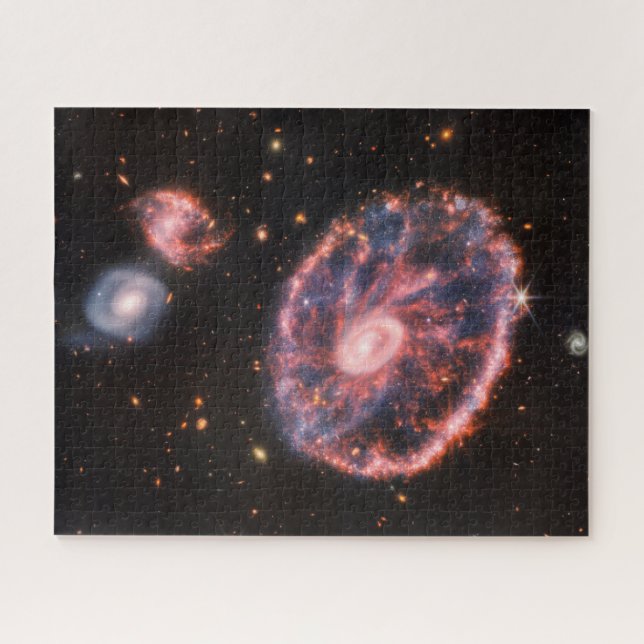 The Cartwheel Galaxy And Its Companion Galaxies. Jigsaw Puzzle (Horizontal)