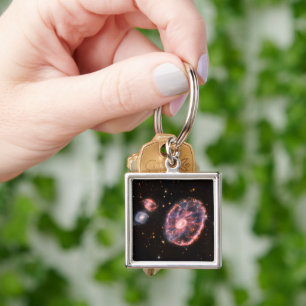 The Cartwheel Galaxy And Its Companion Galaxies. Keychain