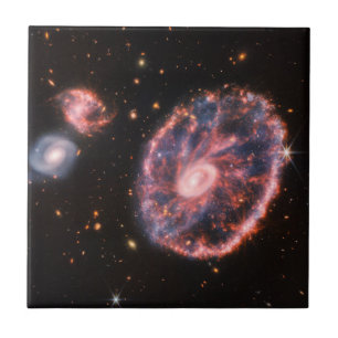 The Cartwheel Galaxy And Its Companion Galaxies. Tile