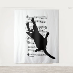 The cat hangs on musical notes tapestry
