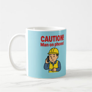 The 'CAUTION! Man on Phone!' mug