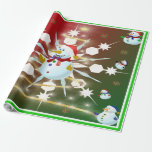 The Christmas Snowman - Wrapping Paper<br><div class="desc">This design features a white and blue snowflake,  a golden tree,  coloured snowflakes and lots of snowmen dressed for a cold Christmas season. A green/red backround and green border was added. This Christmas wrapping paper is available in assorted styles,  colours and sizes.</div>