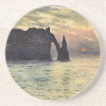 The Cliff Etretat, Sunset by Claude Monet Coaster<br><div class="desc">The Cliff, Etretat, Sunset (1883) by Claude Monet is a vintage impressionist fine art nautical painting. The sun is low in the sky over the ocean. A maritime seascape featuring a rocky outcrop near the shore at Etretat, France. About the artist: Claude Monet (1840-1926) was a founder of the French...</div>