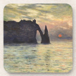 The Cliff Etretat, Sunset by Claude Monet Coaster<br><div class="desc">The Cliff, Etretat, Sunset (1883) by Claude Monet is a vintage impressionist fine art nautical painting. The sun is low in the sky over the ocean. A maritime seascape featuring a rocky outcrop near the shore at Etretat, France. About the artist: Claude Monet (1840-1926) was a founder of the French...</div>