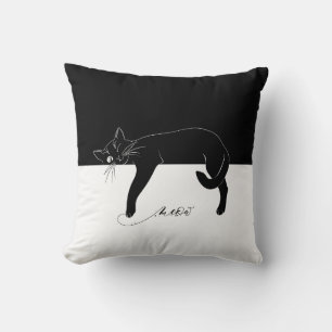 The cunning black cat dangled its paws throw pillow