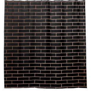 The dark black brick wall has a rough surface as a