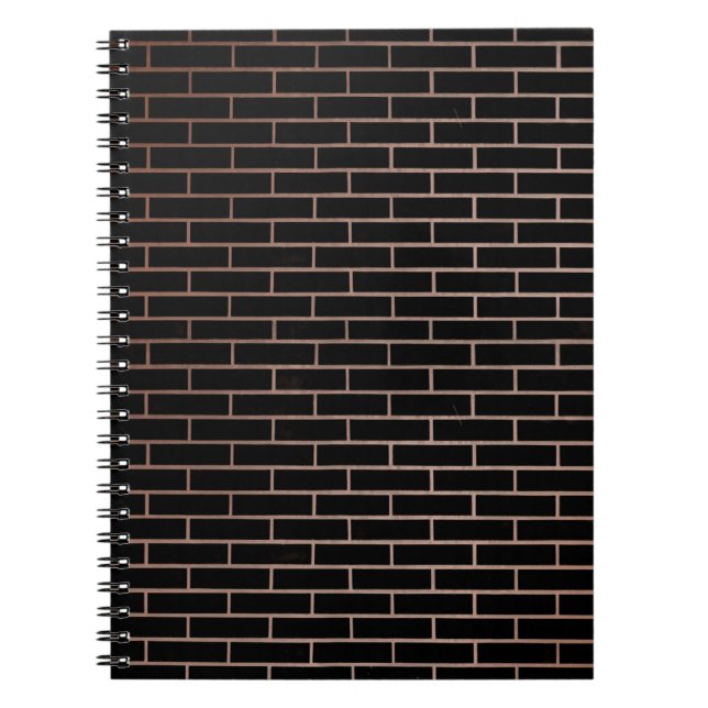 The dark black brick wall has a rough surface as a notebook (Front)
