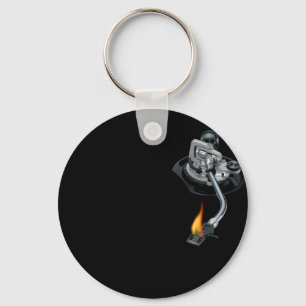 the dj arm on fire keychain