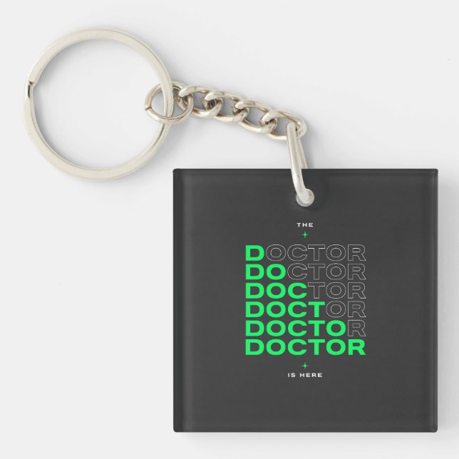 The Doctor Is Here Neon Text Design Keychain (Front)