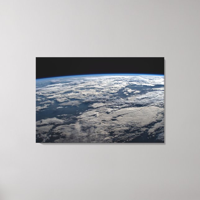 The Earth's Limb Above A Cloudy Western Australia. Canvas Print (Front)