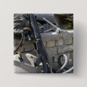 The equipment of a Marine 2 Inch Square Button