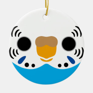 The face of a normal sky blue female budgie ceramic ornament