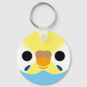 The face of a pastel rainbow female budgie keychain