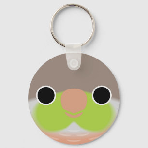 The face of a Pineapple Green-cheeked parakeet Keychain