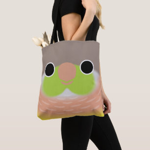 The face of a Pineapple Green-cheeked parakeet Tote Bag