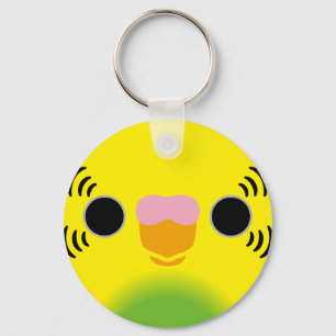 The face of a recessive pied budgie keychain
