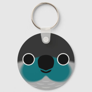 The face of a Turquoise Green-cheeked parakeet Keychain