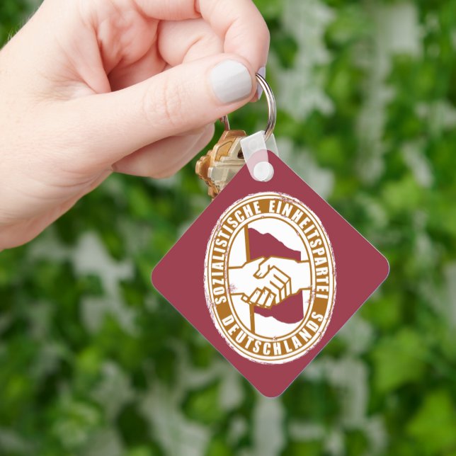 THE FUTURE BELONGS TO US KEYCHAIN (Hand)
