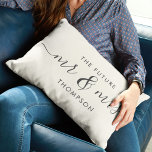 The Future Mr and Mrs Elegant Script Calligraphy Lumbar Pillow<br><div class="desc">Celebrate your love with this chic and romantic throw pillow featuring your future Mr & Mrs family name in charcoal vintage script calligraphy lettering. Choose your own background colour under customize further. This would make the perfect gift for a bridal shower, engagement, or Valentine's Day. The grey and ivory tones...</div>