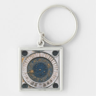 The gold and enamel clock face, design begun by Ma Keychain