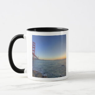 The Golden Gate Bridge at sunrise from Fort Mug