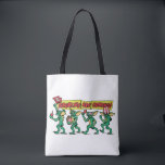The Gremlins™ Are Coming Tote Bag<br><div class="desc">Get ready for mischief with this bold, retro-inspired design featuring a lineup of playful gremlins marching in with snacks, 3D glasses, and movie-night chaos. With expressive poses, classic creature styling, and vibrant comic-book lettering, this artwork captures the mischievous spirit and cult-favorite energy fans love. The dynamic banner headline and colorful...</div>