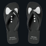 The Groom. Fun White Bow Tie & Buttons Wedding Flip Flops<br><div class="desc">These cute flip flops are perfect for the groom when he's ready to kick off his shoes and party. They feature a cute mock tuxedo design with a white bow tie and buttons at the top and his name and title below.</div>
