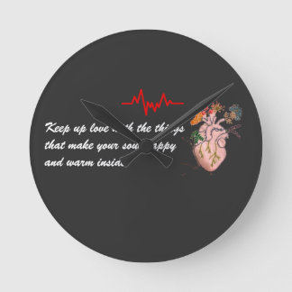 the heart that beats with life Wall Clock
