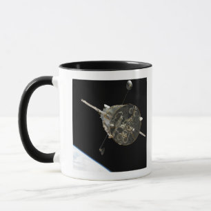 The Hubble Space Telescope in orbit above Earth Mug