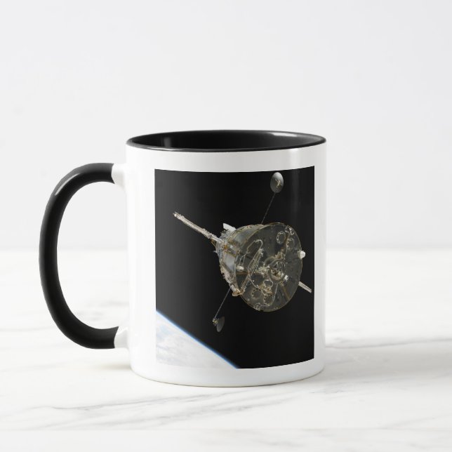 The Hubble Space Telescope in orbit above Earth Mug (Left)